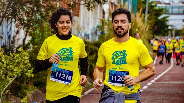 Two athletes participating in a marathon, showing determination and joy.
